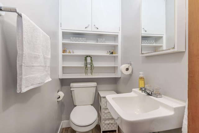 1736 Glenvale Dr SW, Wyoming, MI 49519 - bathroom featuring a sink and toilet