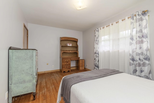 1736 Glenvale Dr SW, Wyoming, MI 49519 - bedroom featuring wood finished floors and baseboards