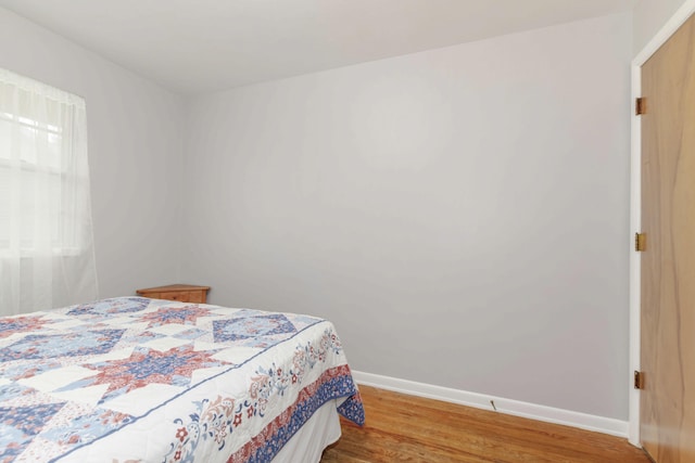 1736 Glenvale Dr SW, Wyoming, MI 49519 - bedroom featuring wood finished floors and baseboards