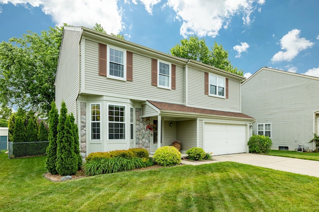 7149 Indian Wells Dr, Ypsilanti, MI 48197 - view of front of home featuring driveway, stone siding, and an attached garage