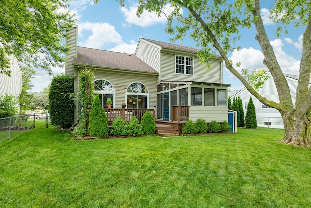 7149 Indian Wells Dr, Ypsilanti, MI 48197 - back of house featuring a sunroom, a deck, and a chimney