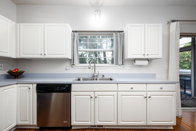 7149 Indian Wells Dr, Ypsilanti, MI 48197 - kitchen featuring stainless steel dishwasher, white cabinetry, and light countertops