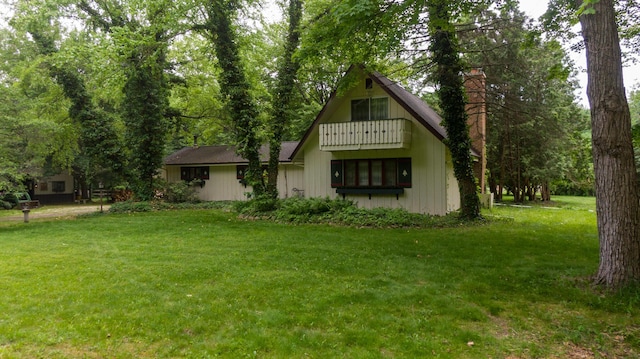 8454 Stickles Rd, Three Oaks, MI 49128 - view of front of property with a front lawn