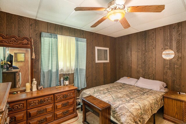4424 Teal Ln, Newaygo, MI 49337 - bedroom with wood walls and ceiling fan