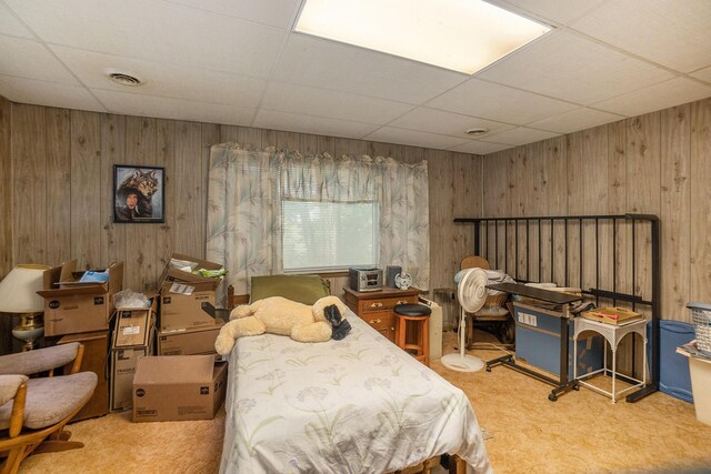4424 Teal Ln, Newaygo, MI 49337 - bedroom with a paneled ceiling, carpet flooring, and wooden walls