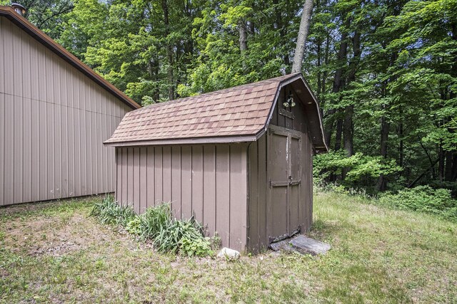 4424 Teal Ln, Newaygo, MI 49337 - view of shed featuring a wooded view