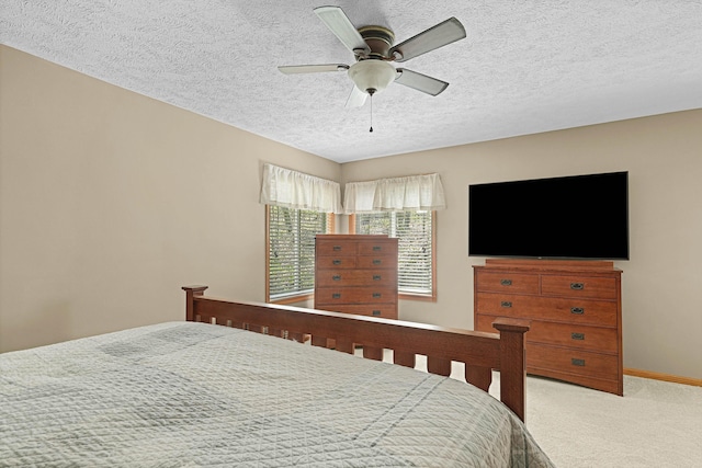 4792 Forest Vale Dr, Pierson, MI 49339 - carpeted bedroom with a textured ceiling and ceiling fan