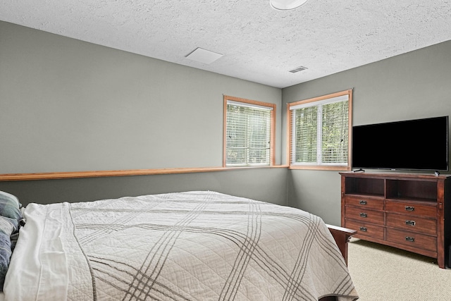 4792 Forest Vale Dr, Pierson, MI 49339 - bedroom with light carpet and a textured ceiling