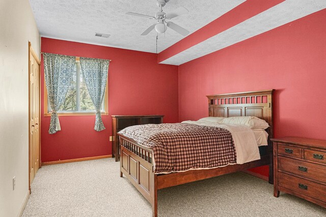 4792 Forest Vale Dr, Pierson, MI 49339 - bedroom featuring light carpet, a textured ceiling, and ceiling fan