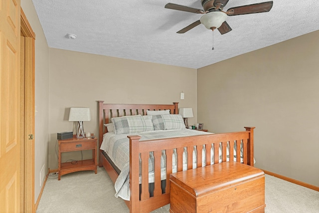 4792 Forest Vale Dr, Pierson, MI 49339 - bedroom featuring light carpet, a textured ceiling, and a ceiling fan
