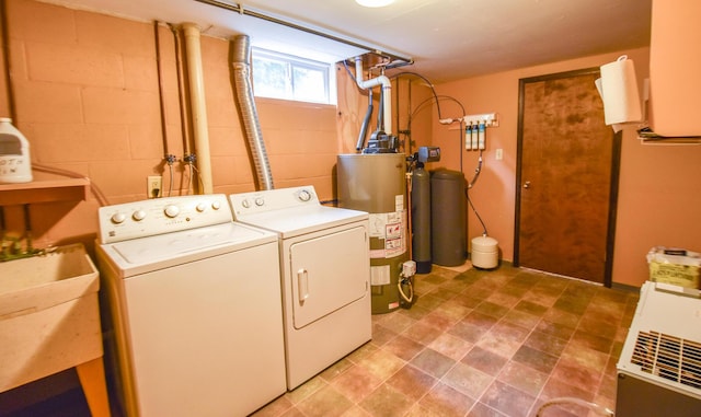 72 Branch Ave, Coldwater, MI 49036 - washroom featuring separate washer and dryer, gas water heater, and concrete block wall