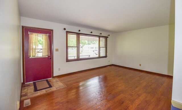 72 Branch Ave, Coldwater, MI 49036 - entrance foyer featuring plenty of natural light and wood finished floors