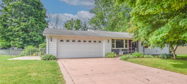 72 Branch Ave, Coldwater, MI 49036 - view of front of property with driveway, a garage, and a chimney