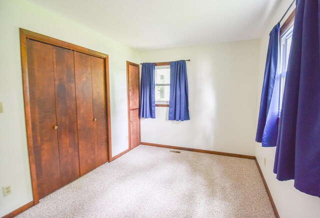 72 Branch Ave, Coldwater, MI 49036 - unfurnished bedroom with carpet and a closet