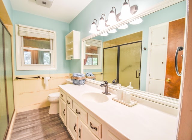 72 Branch Ave, Coldwater, MI 49036 - full bath featuring a stall shower, vanity, and wood finished floors