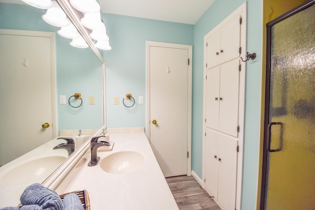 72 Branch Ave, Coldwater, MI 49036 - full bathroom featuring a shower stall, wood finished floors, and vanity