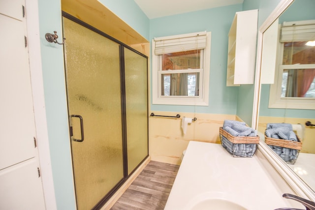 72 Branch Ave, Coldwater, MI 49036 - full bath with wood finished floors, a shower stall, and vanity