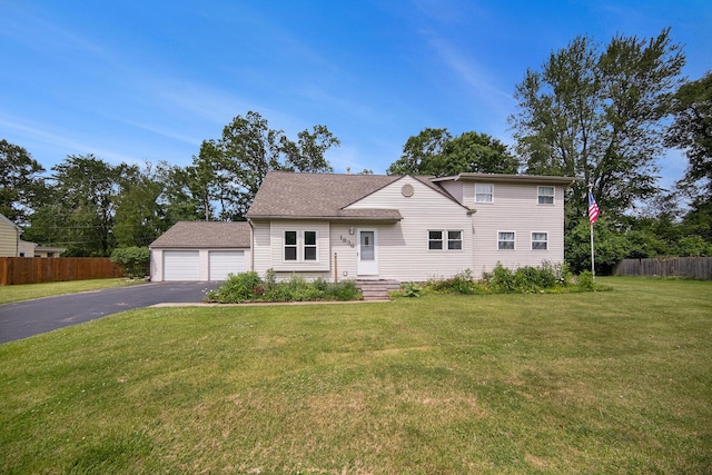 1836 W Argus Ct, Jackson, MI 49203 - traditional-style house with asphalt driveway and roof with shingles