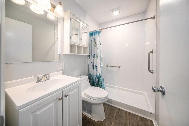 1836 W Argus Ct, Jackson, MI 49203 - bathroom with wood finished floors, a shower with curtain, and vanity