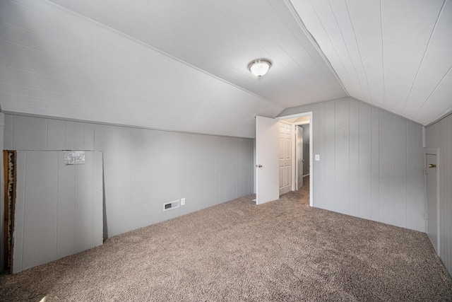 1836 W Argus Ct, Jackson, MI 49203 - additional living space featuring carpet and vaulted ceiling