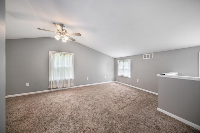 1836 W Argus Ct, Jackson, MI 49203 - carpeted empty room with a ceiling fan and lofted ceiling