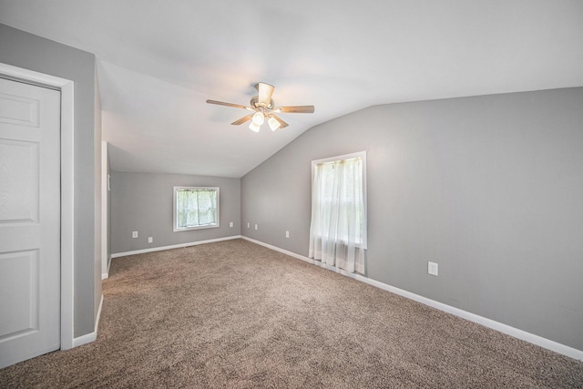 1836 W Argus Ct, Jackson, MI 49203 - unfurnished room featuring lofted ceiling, a ceiling fan, and carpet flooring
