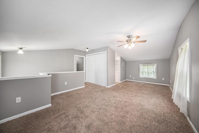 1836 W Argus Ct, Jackson, MI 49203 - carpeted empty room with a ceiling fan and lofted ceiling