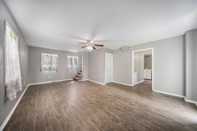1836 W Argus Ct, Jackson, MI 49203 - spare room with ceiling fan, stairs, and dark wood finished floors