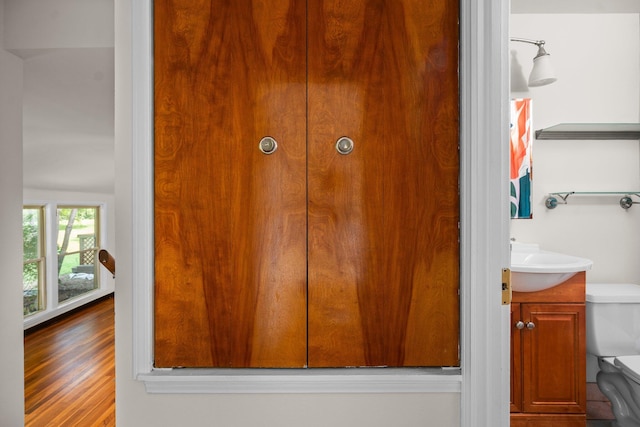2834 Pittsfield Blvd, Ann Arbor, MI 48104 - detailed view of vanity and wood finished floors