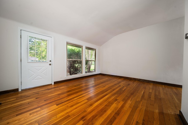 2834 Pittsfield Blvd, Ann Arbor, MI 48104 - empty room with vaulted ceiling and dark wood-style flooring