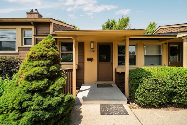 2834 Pittsfield Blvd, Ann Arbor, MI 48104 - entrance to property featuring a chimney
