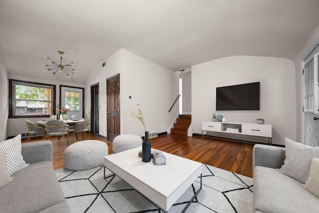 2834 Pittsfield Blvd, Ann Arbor, MI 48104 - living room with lofted ceiling, stairs, wood finished floors, and a chandelier