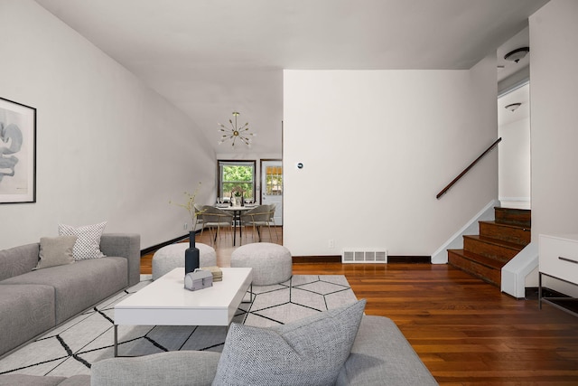 2834 Pittsfield Blvd, Ann Arbor, MI 48104 - living area featuring a chandelier, wood finished floors, and stairway