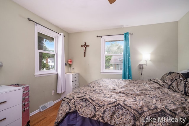 4128 Michael Ave SW, Wyoming, MI 49509 - bedroom with wood finished floors and baseboards