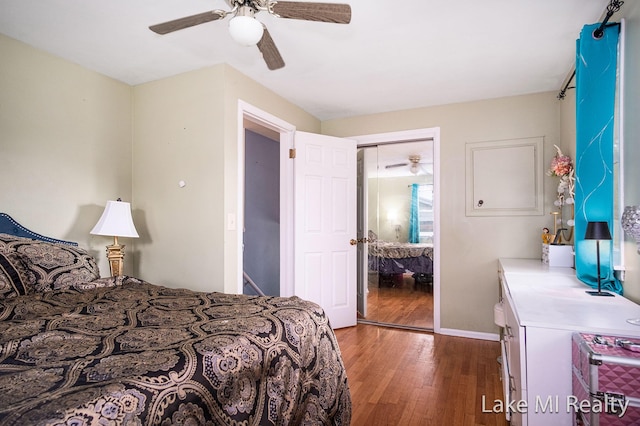4128 Michael Ave SW, Wyoming, MI 49509 - bedroom with wood finished floors, ceiling fan, and a closet