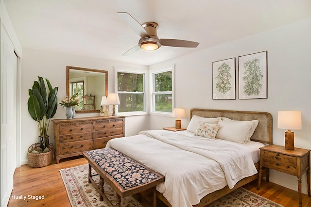 105 S Emerson Lake Rd, Branch, MI 49402 - bedroom featuring light wood finished floors and ceiling fan