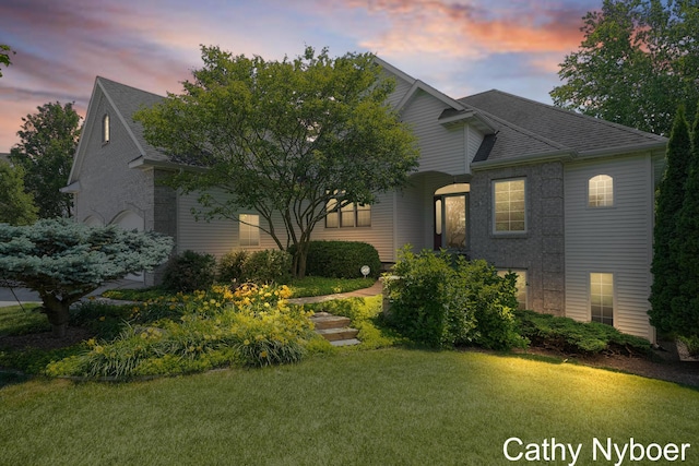 4232 Limousin Ct SW, Grandville, MI 49418 - view of front facade featuring a lawn and roof with shingles