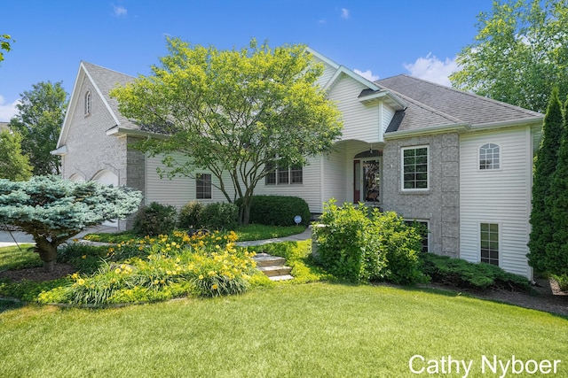 4232 Limousin Ct SW, Grandville, MI 49418 - traditional home with a front lawn and a shingled roof