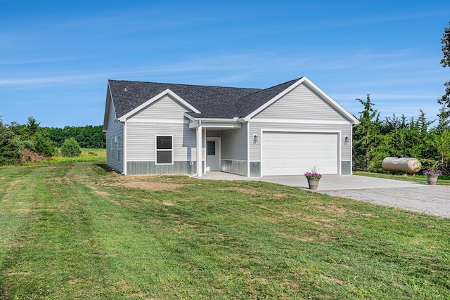 57860 James Dr, Three Rivers, MI 49093 - traditional-style house featuring driveway, a garage, a front lawn, and a shingled roof