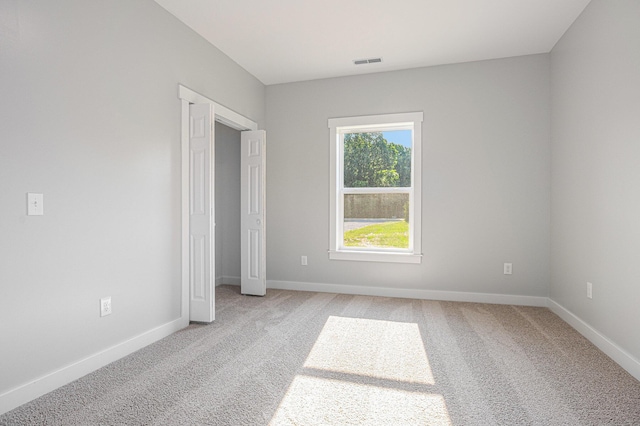 57860 James Dr, Three Rivers, MI 49093 - unfurnished bedroom featuring light carpet
