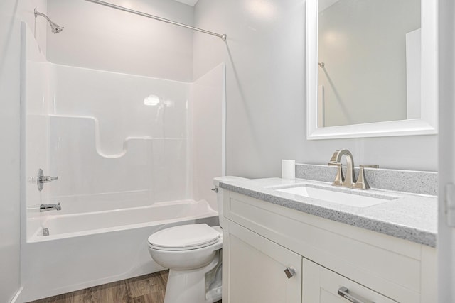 57860 James Dr, Three Rivers, MI 49093 - full bathroom with wood finished floors, vanity, and shower / tub combination