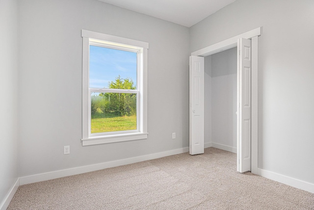 57860 James Dr, Three Rivers, MI 49093 - unfurnished bedroom with light colored carpet and baseboards