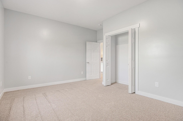 57860 James Dr, Three Rivers, MI 49093 - unfurnished bedroom with light carpet and baseboards