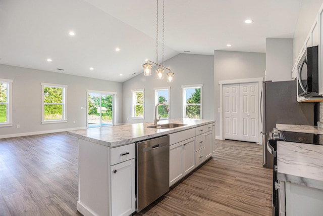 57860 James Dr, Three Rivers, MI 49093 - kitchen featuring dishwasher, an island with sink, range with electric stovetop, wood finished floors, and white cabinetry