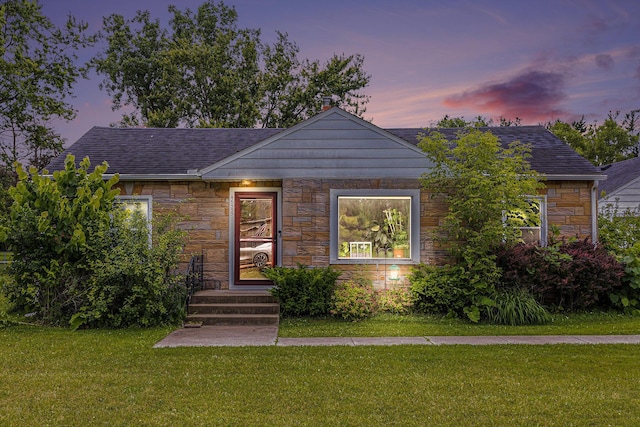 46555 Maben Rd, Canton, MI 48187 - bungalow with stone siding, a front yard, and roof with shingles