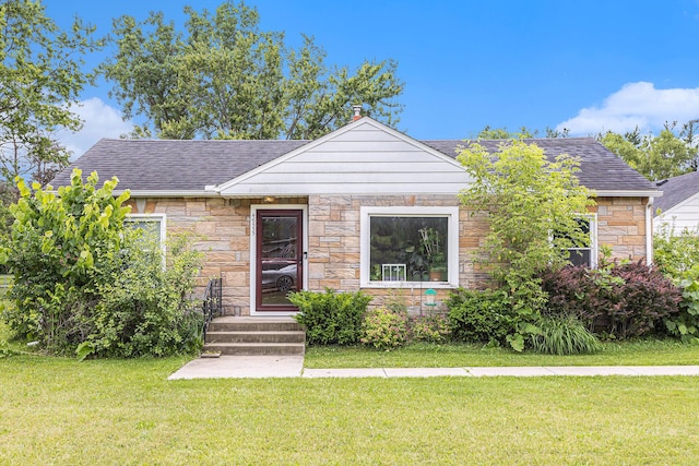 46555 Maben Rd, Canton, MI 48187 - bungalow-style home featuring stone siding, a front lawn, and roof with shingles