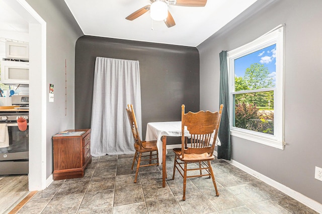 46555 Maben Rd, Canton, MI 48187 - dining area featuring a ceiling fan and baseboards