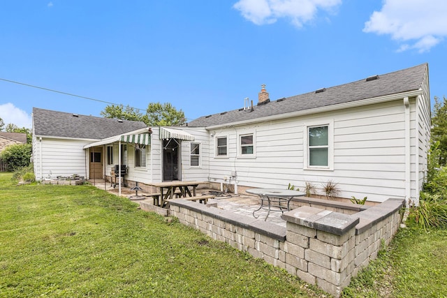 46555 Maben Rd, Canton, MI 48187 - back of property featuring a patio area, a lawn, and a chimney