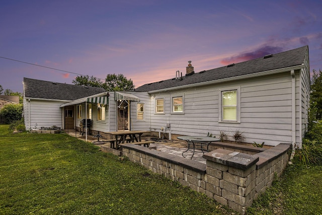 46555 Maben Rd, Canton, MI 48187 - back of property with a patio, a yard, and a chimney