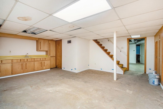 2425 University Ave, Kalamazoo, MI 49008 - finished below grade area with stairs and a paneled ceiling